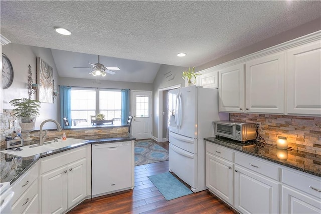 21212 E 52nd Street Ct, Blue Springs, MO 64015 - kitchen featuring a sink, dark wood-style flooring, lofted ceiling, a ceiling fan, and white appliances