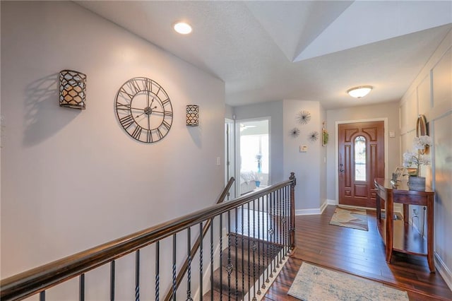 21212 E 52nd Street Ct, Blue Springs, MO 64015 - entrance foyer featuring baseboards and dark wood-style flooring