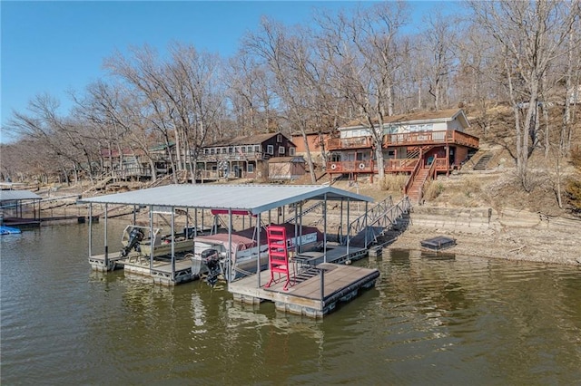 view of dock with stairway and a water view