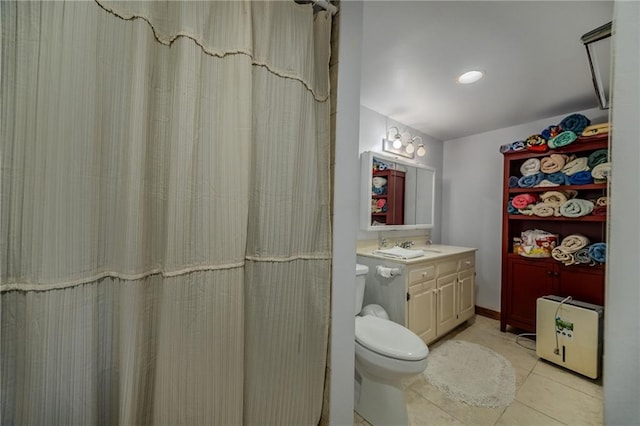 bathroom with vanity, tile patterned floors, toilet, and a shower with shower curtain