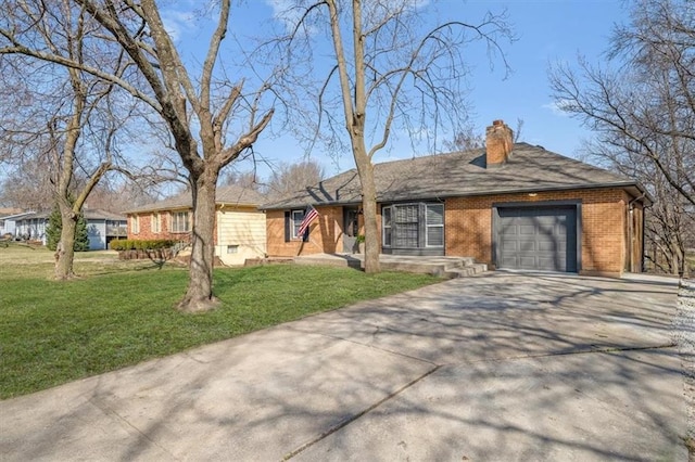 ranch-style house featuring brick siding, a front yard, a chimney, driveway, and an attached garage