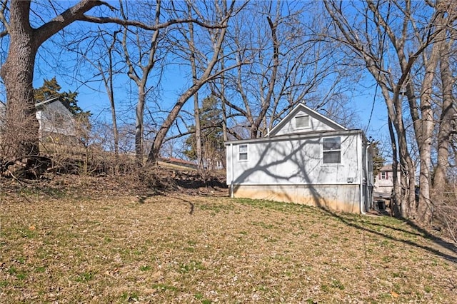 view of property exterior featuring a yard