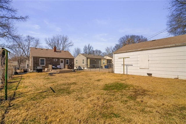 view of yard featuring a wooden deck and fence private yard