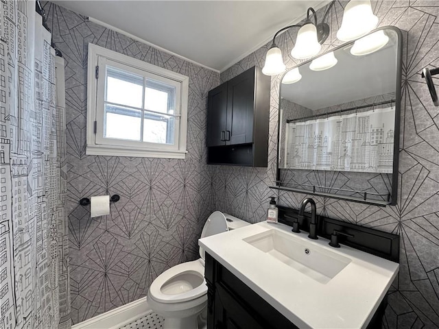 bathroom featuring toilet, tile walls, and vanity