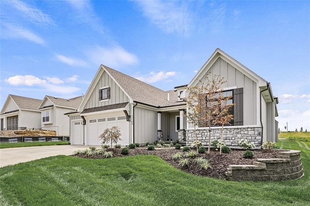 modern inspired farmhouse featuring board and batten siding, concrete driveway, and a front yard