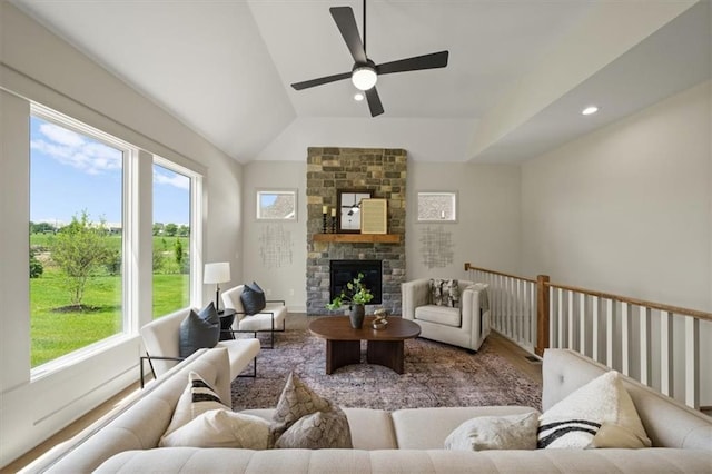 22109 W 80th Ter, Shawnee, KS 66220 - living room with ceiling fan, wood finished floors, a fireplace, and lofted ceiling