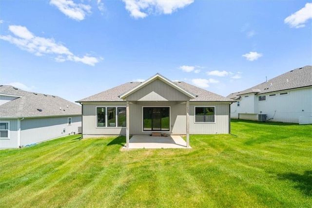 22109 W 80th Ter, Shawnee, KS 66220 - rear view of house with a patio and a lawn