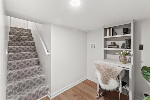 office space featuring light wood-style floors and baseboards