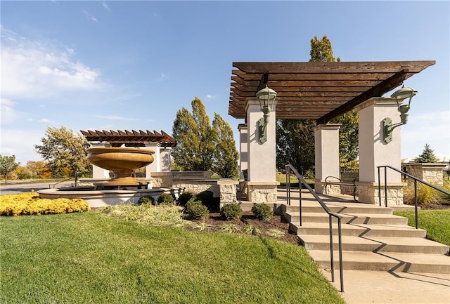 view of property's community featuring a yard and a pergola