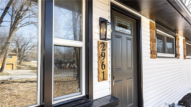 entrance to property with covered porch