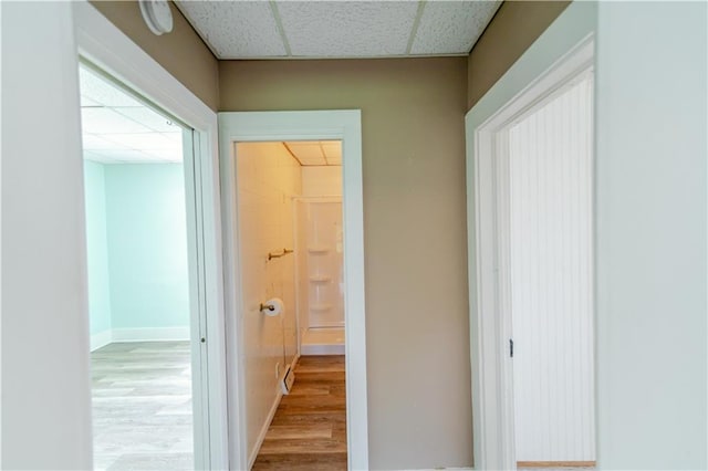 713 N 13th St, Atchison, KS 66002 - hall with a drop ceiling and wood finished floors