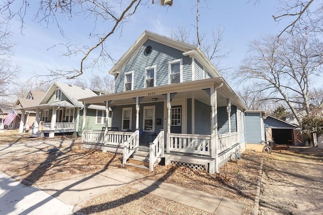 farmhouse inspired home featuring a porch