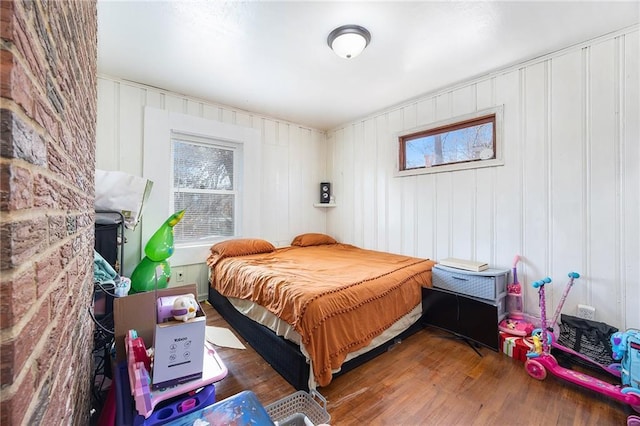 bedroom with wood finished floors