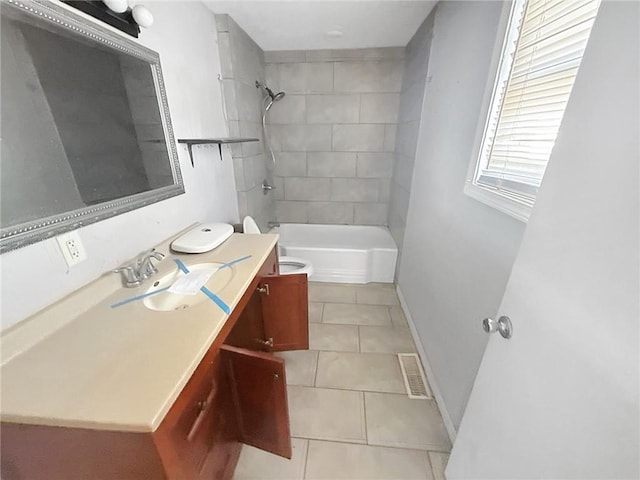 full bath featuring visible vents, toilet, tile patterned flooring, baseboards, and vanity