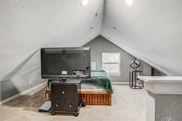 office space featuring lofted ceiling, carpet floors, and a textured ceiling