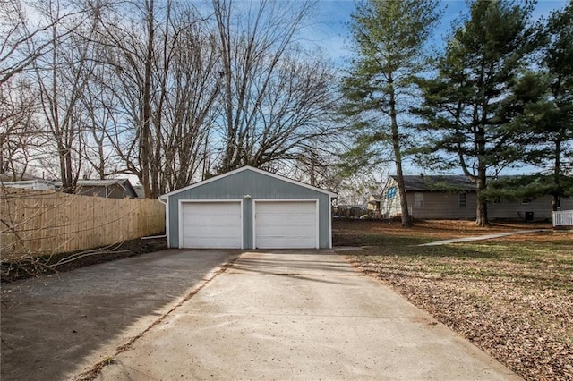 detached garage with fence