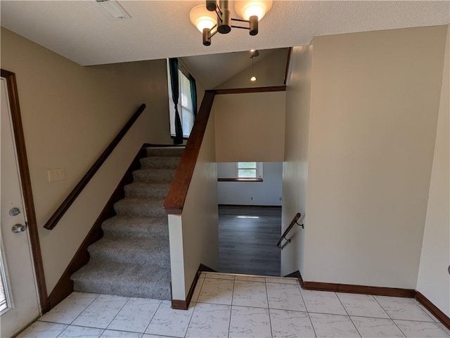 1900 SE 6th Ter, Lees Summit, MO 64063 - staircase featuring baseboards