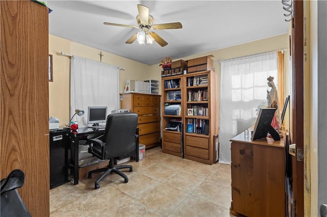 office space featuring ceiling fan