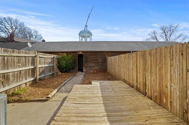 exterior space with a fenced backyard