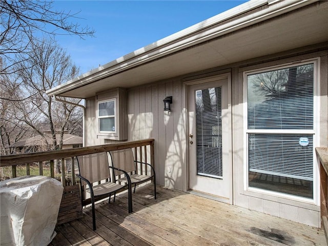 wooden deck with grilling area