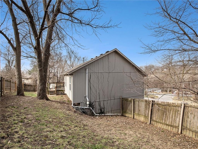 view of outbuilding featuring a fenced backyard