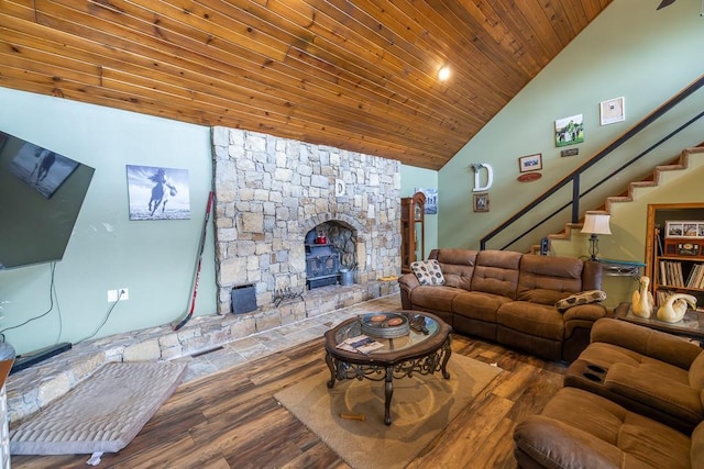 living room with stairway, wood finished floors, high vaulted ceiling, and wooden ceiling