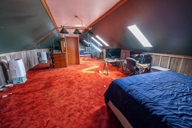 carpeted bedroom with lofted ceiling with skylight, wooden walls, and ornamental molding