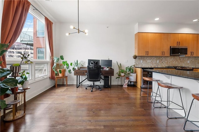 home office featuring dark wood-style floors, baseboards, an inviting chandelier, recessed lighting, and wine cooler