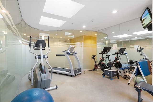 workout area featuring a skylight