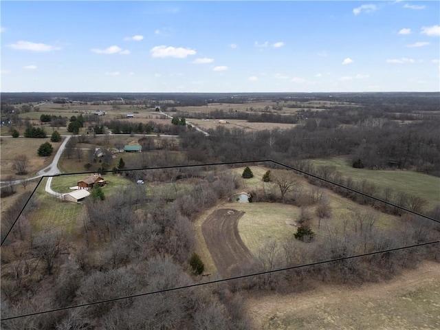 birds eye view of property featuring a rural view