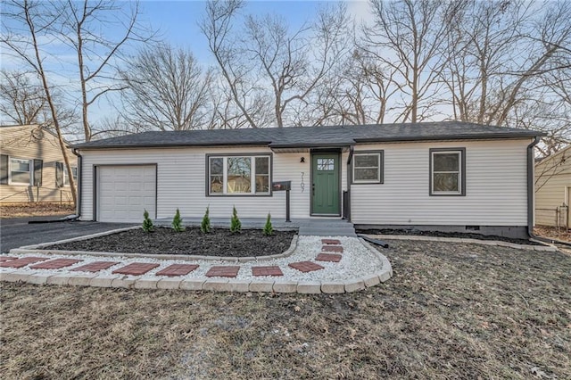 single story home featuring crawl space, driveway, and an attached garage