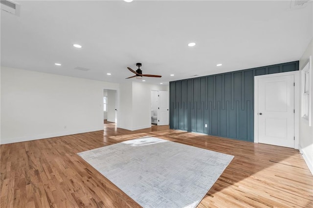 unfurnished living room with visible vents, recessed lighting, light wood-style floors, and a ceiling fan