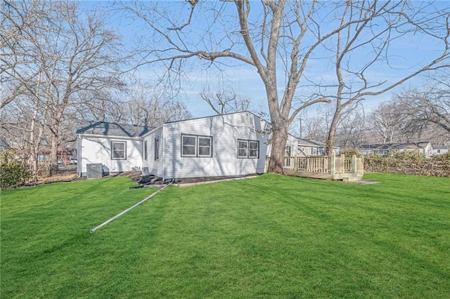 view of yard featuring a wooden deck