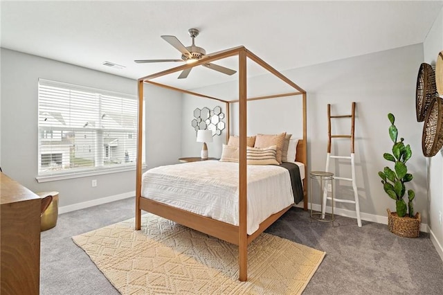 bedroom featuring visible vents, baseboards, carpet, and a ceiling fan