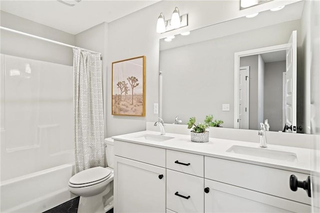 full bathroom with double vanity, shower / bathtub combination with curtain, toilet, and a sink