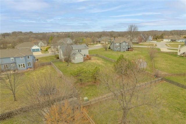 birds eye view of property with a residential view