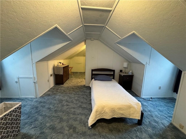 carpeted bedroom featuring vaulted ceiling and a textured ceiling