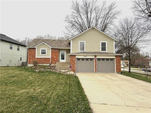 split level home with a front yard, driveway, an attached garage, a shingled roof, and brick siding