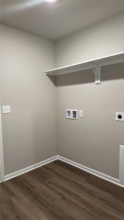 clothes washing area featuring baseboards, dark wood finished floors, laundry area, hookup for a washing machine, and hookup for an electric dryer