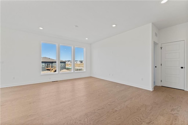 10612 N Jefferson St, Kansas City, MO 64155 - unfurnished room featuring visible vents, recessed lighting, baseboards, and light wood-type flooring
