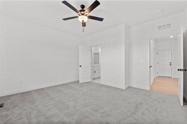 10612 N Jefferson St, Kansas City, MO 64155 - unfurnished bedroom featuring visible vents, ceiling fan, baseboards, and carpet floors