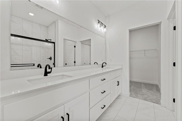 10612 N Jefferson St, Kansas City, MO 64155 - full bath featuring double vanity, marble finish floor, a shower stall, and a sink