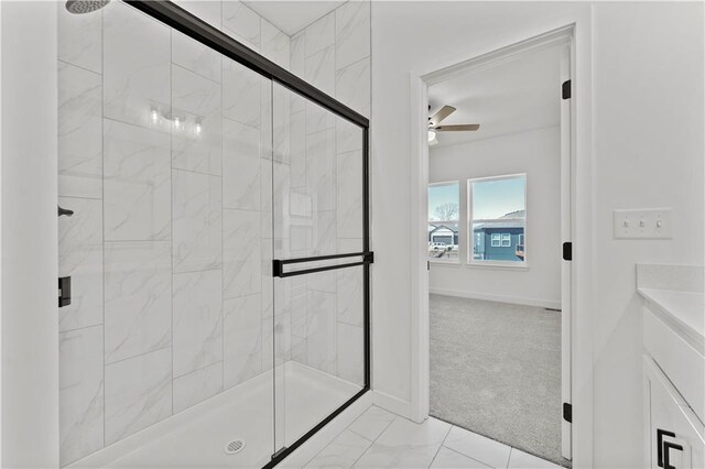 10612 N Jefferson St, Kansas City, MO 64155 - bathroom with a shower stall, baseboards, marble finish floor, and ceiling fan