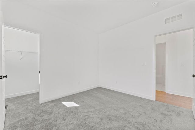 10612 N Jefferson St, Kansas City, MO 64155 - spare room with visible vents, baseboards, and carpet floors