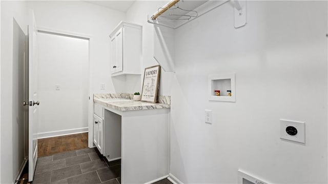 4822 NE 105th St, Kansas City, MO 64156 - washroom with hookup for an electric dryer, washer hookup, cabinet space, and baseboards