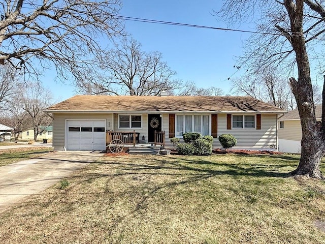 ranch-style home featuring an attached garage, driveway, and a front lawn