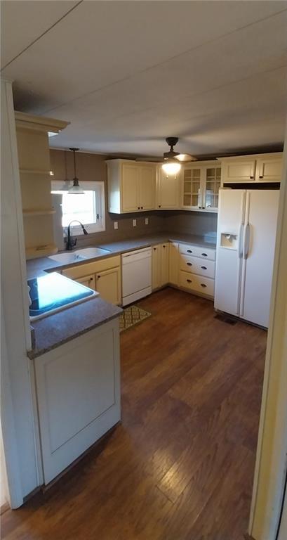 20824 NE 172nd St, Holt, MO 64048 - kitchen featuring white appliances, dark wood-style flooring, a sink, ceiling fan, and glass insert cabinets