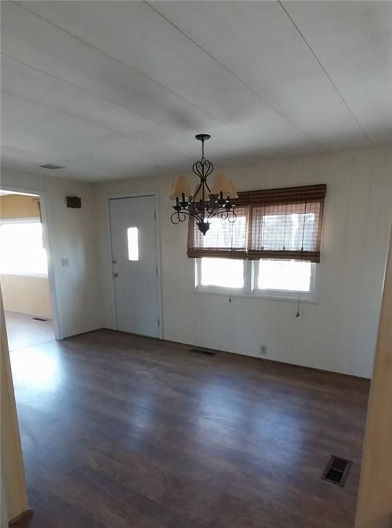 20824 NE 172nd St, Holt, MO 64048 - interior space featuring visible vents, a notable chandelier, and wood finished floors