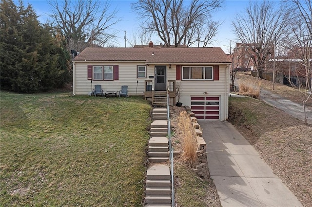 view of front of property featuring driveway, an attached garage, a chimney, stairs, and a front lawn