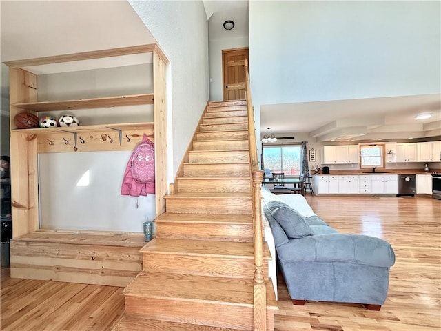 stairs with wood finished floors